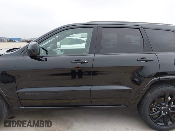 2021 Jeep Grand Cherokee Laredo X with VIN 1C4RJEAG8MC714539, listed as a IAAI auction lot 42190686 with 59,359 mi miles and . Bid and sale history available at DreamBid. Image 14.