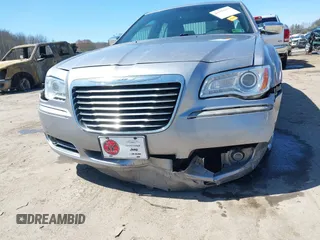 2014 Chrysler 300 C with VIN 2C3CCAKG6EH379114, listed as a IAAI auction lot 41992957 with 151,949 mi miles and . Bid and sale history available at carsss.com. Image 6.