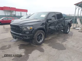 2022 Ram 1500 Big Horn with VIN 1C6SRFFT3NN287385, listed as a IAAI auction lot 41793596 with 12,277 mi miles and . Bid and sale history available at DreamBid. Image 2.