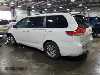 2013 Toyota Sienna XLE AAS with VIN 5TDYK3DC9DS330919, listed as a Copart auction lot 59094495 with 147,638 mi miles and Salvage title. Bid and sale history available at DreamBid. Image 2.