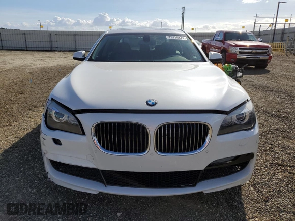 2011 BMW 7 Series 740Li with VIN WBAKB4C58BC573888, listed as a Copart auction lot 78736874 with 76,832 mi miles and Salvage Title. Bid and sale history available at DreamBid. Image 5.