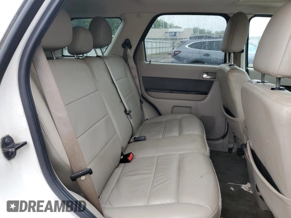 2010 Ford Escape Hybrid with VIN 1FMCU4K35AKB43740, listed as a Copart auction lot 58714855 with 116,463 mi miles and Salvage title. Bid and sale history available at DreamBid. Image 11.