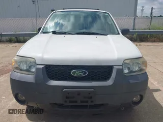 2006 Ford Escape XLT z VIN 1FMCU03106KA68555, wystawiony jako IAAI lot #42639823 z przebiegiem 147 320 mil mil oraz . Historia ofert i sprzedaży dostępna na DreamBid. Obrazek 13.