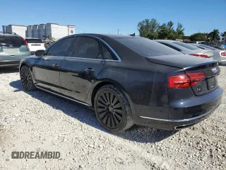 2015 Audi A8 с VIN WAUJGAFD5FN018180, выставлен на аукционе Copart как лот 87873925 с пробегом Не указан миль и Списание • Salvage title. История ставок и продаж доступна на DreamBid. Изображение 2.