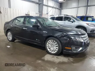 2012 Ford Fusion Hybrid с VIN 3FADP0L33CR231536, выставлен на аукционе Copart как лот 55330545 с пробегом 165 481 миль миль и Списание • Salvage title. История ставок и продаж доступна на DreamBid. Изображение 4.