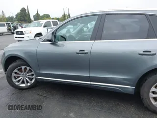 2016 Audi Q5 Premium Plus z VIN WA1L2AFPXGA057810, wystawiony jako IAAI lot #42730057 z przebiegiem 129 551 mil mil oraz . Historia ofert i sprzedaży dostępna na DreamBid. Obrazek 14.