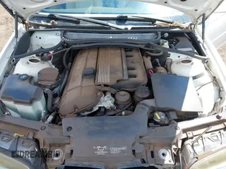 2003 BMW 3 Series 325Ci with VIN WBABS33483JY44155, listed as a IAAI auction lot 41603387 with 133,362 mi miles. Bid and sale history available at carsss.com. Image 10.