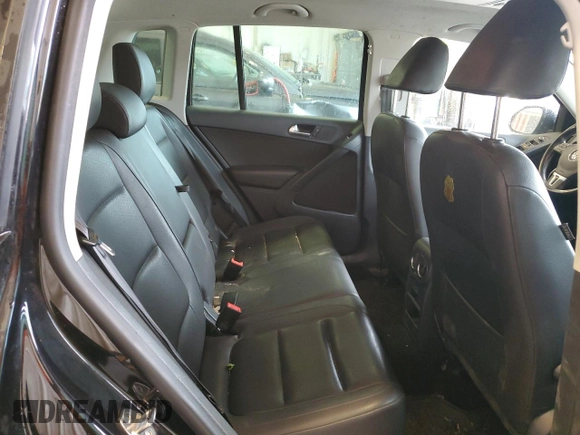 2013 Volkswagen Tiguan S with VIN WVGAV3AX1DW602083, listed as a Copart auction lot 57977515 with 114,375 mi miles and Clean title. Bid and sale history available at DreamBid. Image 11.