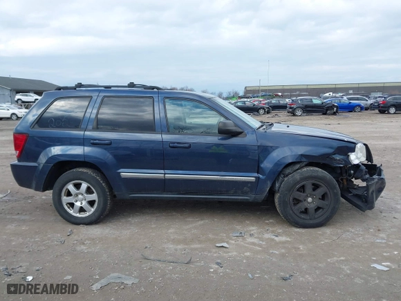 2010 Jeep Grand Cherokee Laredo with VIN 1J4PR4GK5AC138498, listed as a IAAI auction lot 41870740 with 130,551 mi miles. Bid and sale history available at carsss.com. Image 13.