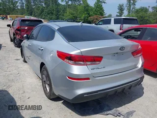 2020 Kia Optima LX with VIN 5XXGT4L3XLG429961, listed as a IAAI auction lot 42483950 with 97,677 mi miles and . Bid and sale history available at DreamBid. Image 3.