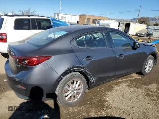 2016 Mazda 3 i Sport with VIN JM1BM1U74G1285879, listed as a Copart auction lot 88374325 with 66,929 mi miles and Salvage Title. Bid and sale history available at DreamBid. Image 3.