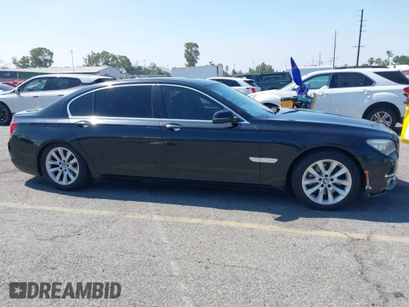 2015 BMW 7 Series 740Li with VIN WBAYE4C57FD138961, listed as a IAAI auction lot 42216122 with 224,740 mi miles and . Bid and sale history available at DreamBid. Image 12.
