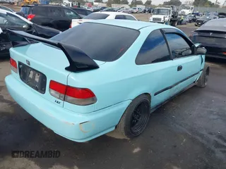 1998 Honda Civic HX with VIN 1HGEJ7127WL127977, listed as a IAAI auction lot 41230187 with 182,000 mi miles. Bid and sale history available at carsss.com. Image 4.