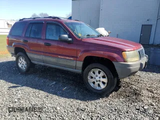 2000 Jeep Grand Cherokee Laredo z VIN 1J4GW48S8YC289367, wystawiony jako Copart lot #51378675 z przebiegiem 176 347 mil mil oraz Szkoda całkowita • Salvage title. Historia ofert i sprzedaży dostępna na DreamBid. Obrazek 4.