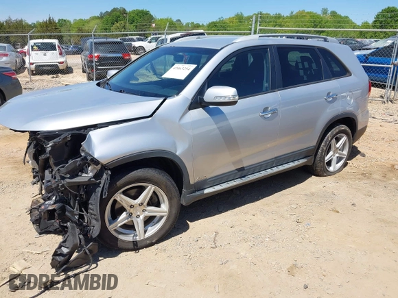 2015 Kia Sorento LX with VIN 5XYKTCA68FG641582, listed as a IAAI auction lot 42063254 with 159,125 mi miles and . Bid and sale history available at DreamBid. Image 2.