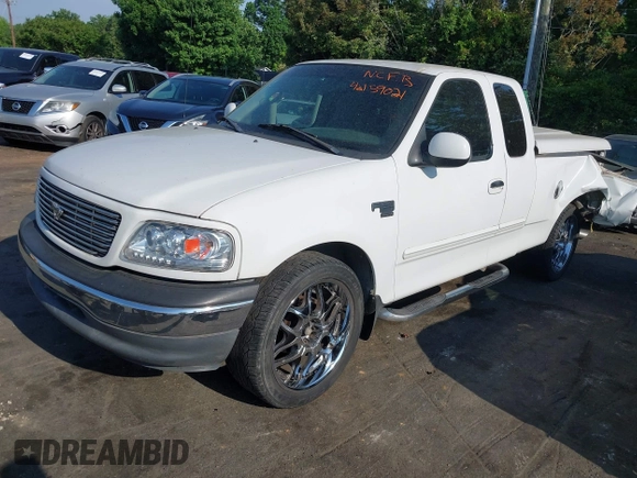2000 Ford F-150 XL with VIN 1FTRX17L7YNB73649, listed as a IAAI auction lot 42159021 with Not provided miles and . Bid and sale history available at DreamBid. Image 2.