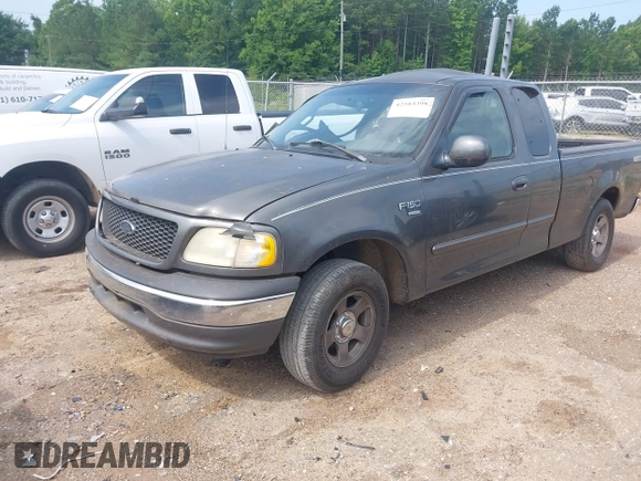 2002 Ford F-150 XL with VIN 1FTRX17W72NA87338, listed as a IAAI auction lot 42583398 with Not provided miles and . Bid and sale history available at DreamBid. Image 2.