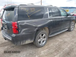 2018 Chevrolet Suburban Premier z VIN 1GNSKJKC3JR189621, wystawiony jako IAAI lot #41925416 z przebiegiem 150 775 mil mil oraz . Historia ofert i sprzedaży dostępna na DreamBid. Obrazek 4.