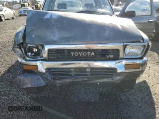 1989 Toyota Pickup DLX z VIN JT4VN13D0K0001910, wystawiony jako Copart lot #77413274 z przebiegiem 311 223 mil mil oraz Szkoda całkowita • Salvage title. Historia ofert i sprzedaży dostępna na DreamBid. Obrazek 11.