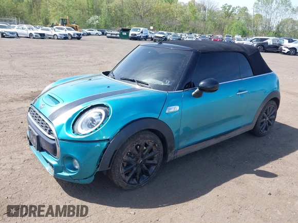 2019 MINI Convertible Cooper S с VIN WMWWG9C54K3E41195, выставлен на аукционе IAAI как лот 42149191 с пробегом 80 033 миль миль и . История ставок и продаж доступна на DreamBid. Изображение 18.