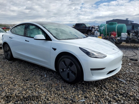 2023 Tesla Model 3 with VIN 5YJ3E1EA9PF569835, listed as a Copart auction lot 50876824 with 25,736 mi miles and Salvage Title. Bid and sale history available at DreamBid. Image 4.