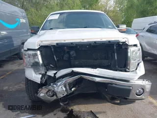 2014 Ford F-150 XL with VIN 1FTFW1EFXEKE92754, listed as a IAAI auction lot 42109551 with 219,130 mi miles. Bid and sale history available at carsss.com. Image 6.