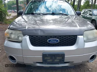 2005 Ford Escape Hybrid with VIN 1FMCU95H45KD91052, listed as a IAAI auction lot 42200393 with 304,817 mi miles and . Bid and sale history available at DreamBid. Image 12.