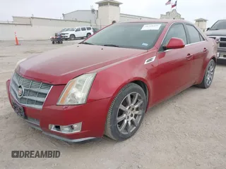 2009 Cadillac CTS RWD w/1SB with VIN 1G6DV57V390133952, listed as a IAAI auction lot 41948486 with 216,593 mi miles. Bid and sale history available at carsss.com. Image 2.
