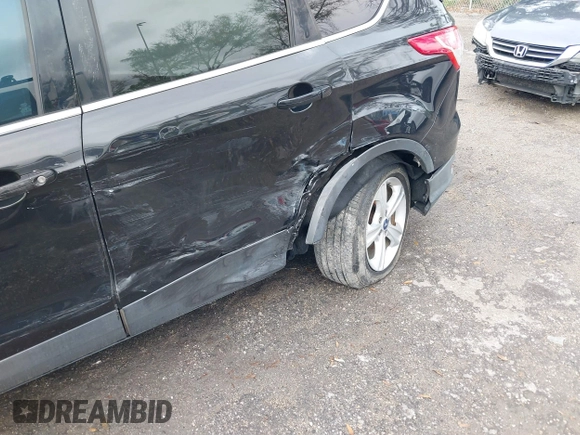 2014 Ford Escape SE z VIN 1FMCU0GX3EUC38084, wystawiony jako IAAI lot #38231507 z przebiegiem 157 955 mil mil oraz . Historia ofert i sprzedaży dostępna na DreamBid. Obrazek 6.