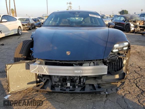 2024 Porsche Taycan with VIN WP0AA2Y10RSA10283, listed as a Copart auction lot 82637484 with 3,036 mi miles and Salvage title. Bid and sale history available at DreamBid. Image 5.