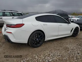 2020 BMW 8 Series M850i with VIN WBAGV8C05LCE00682, listed as a Copart auction lot 77863994 with 22,999 mi miles and Salvage Title. Bid and sale history available at carsss.com. Image 3.