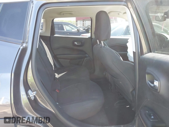 2019 Jeep Compass Sport with VIN 3C4NJCAB2KT613117, listed as a IAAI auction lot 41999519 with 73,734 mi miles and . Bid and sale history available at DreamBid. Image 8.