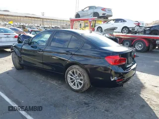 2016 BMW 3 Series 320i with VIN WBA8E1G57GNT34158, listed as a IAAI auction lot 41460721 with 123,765 mi miles and . Bid and sale history available at carsss.com. Image 3.