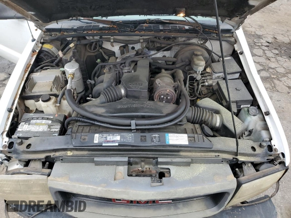 1998 GMC Sonoma z VIN 1GTCS1443W8511481, wystawiony jako Copart lot #54587395 z przebiegiem 104 975 mil mil oraz Szkoda całkowita • Salvage title. Historia ofert i sprzedaży dostępna na DreamBid. Obrazek 11.