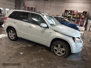 2006 Suzuki Grand Vitara Luxury with VIN JS3TD947764101438, listed as a IAAI auction lot 41610148 with 172,483 mi miles. Bid and sale history available at carsss.com. Image 1.