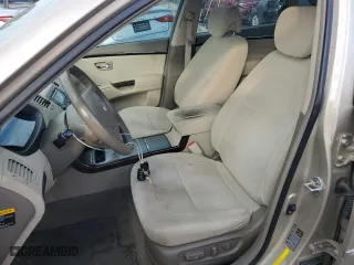 2009 Hyundai Azera GLS with VIN KMHFC46D09A360665, listed as a Copart auction lot 71665544 with 143,711 mi miles and Salvage Title. Bid and sale history available at carsss.com. Image 7.