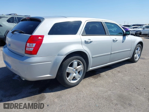 2005 Dodge Magnum z VIN 2D8GZ58235H576127, wystawiony jako IAAI lot #41989680 z przebiegiem 136 488 mil mil oraz . Historia ofert i sprzedaży dostępna na DreamBid. Obrazek 4.