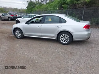 2015 Volkswagen Passat 1.8T Limited Edition with VIN 1VWAT7A32FC003645, listed as a IAAI auction lot 42091376 with 140,675 mi miles. Bid and sale history available at carsss.com. Image 3.