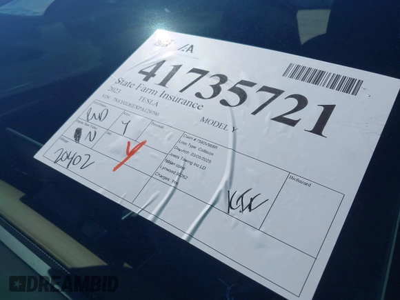 2023 Tesla Model Y Long Range with VIN 7SAYGDEEXPA129790, listed as a IAAI auction lot 41735721 with 20,402 mi miles and . Bid and sale history available at DreamBid. Image 20.