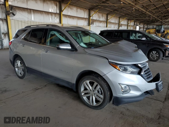2019 Chevrolet Equinox Premier z VIN 3GNAXYEX3KS592663, wystawiony jako Copart lot #59635385 z przebiegiem 70 575 mil mil oraz Szkoda całkowita • Salvage title. Historia ofert i sprzedaży dostępna na DreamBid. Obrazek 4.