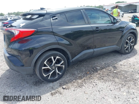 2018 Toyota C-HR XLE with VIN NMTKHMBX0JR008423, listed as a IAAI auction lot 42091445 with 124,811 mi miles. Bid and sale history available at carsss.com. Image 4.
