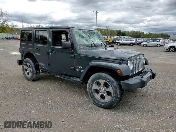 2018 Jeep Wrangler JK Unlimited Sahara with VIN 1C4HJWEG2JL835901, listed as a Copart auction lot 74591474 with 20,389 mi miles and Salvage Title. Bid and sale history available at carsss.com. Image 12.