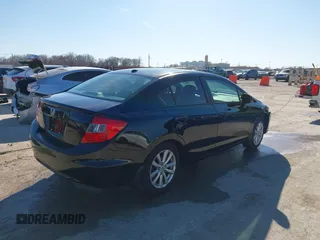 2012 Honda Civic EX-L with VIN 19XFB2F90CE004423, listed as a IAAI auction lot 41653412 with 173,662 mi miles and . Bid and sale history available at DreamBid. Image 4.