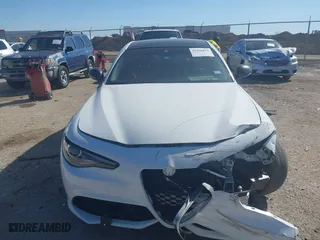 2018 Alfa Romeo Giulia Ti Sport with VIN ZARFAEEN9J7572787, listed as a IAAI auction lot 41646814 with 56,094 mi miles. Bid and sale history available at carsss.com. Image 12.