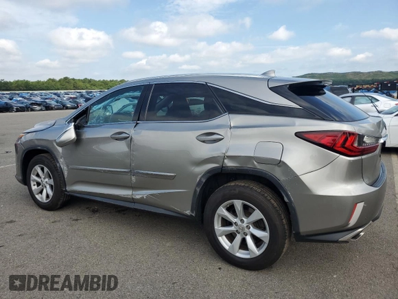 2017 Lexus RX 350 with VIN 2T2BZMCA2HC114007, listed as a Copart auction lot 63587985 with 61,421 mi miles and Salvage title. Bid and sale history available at DreamBid. Image 2.