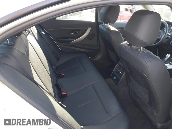 2013 BMW 3 Series 328i xDrive with VIN WBA3B5G54DNP40324, listed as a IAAI auction lot 41702014 with 126,932 mi miles. Bid and sale history available at carsss.com. Image 8.