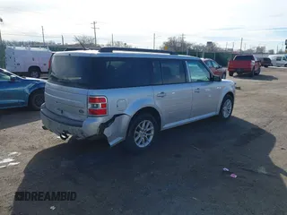 2016 Ford Flex SE z VIN 2FMGK5B8XGBA23900, wystawiony jako IAAI lot #41599714 z przebiegiem 102 961 mil mil oraz . Historia ofert i sprzedaży dostępna na DreamBid. Obrazek 4.