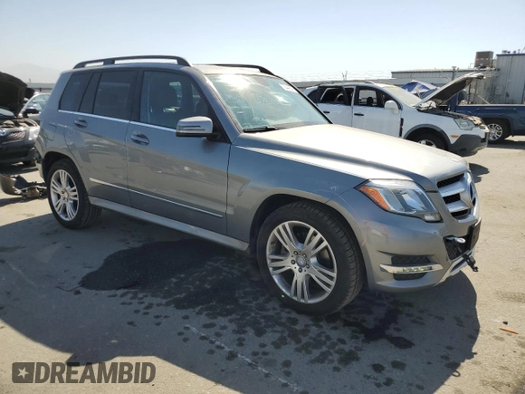 2015 Mercedes-Benz GLK 350 with VIN WDCGG5HB5FG439945, listed as a Copart auction lot 75044054 with 76,506 mi miles and Salvage Title. Bid and sale history available at DreamBid. Image 4.