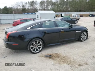 2015 Jaguar XJ with VIN SAJWA1CZ1F8V85402, listed as a Copart auction lot 86717734 with 201,249 mi miles and Salvage Title. Bid and sale history available at carsss.com. Image 3.