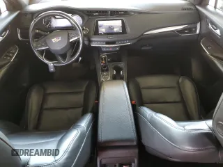 2022 Cadillac XT4 FWD Luxury с VIN 1GYAZAR40NF120224, выставлен на аукционе Copart как лот 61100285 с пробегом 35 260 миль миль и Списание • Salvage title. История ставок и продаж доступна на DreamBid. Изображение 8.